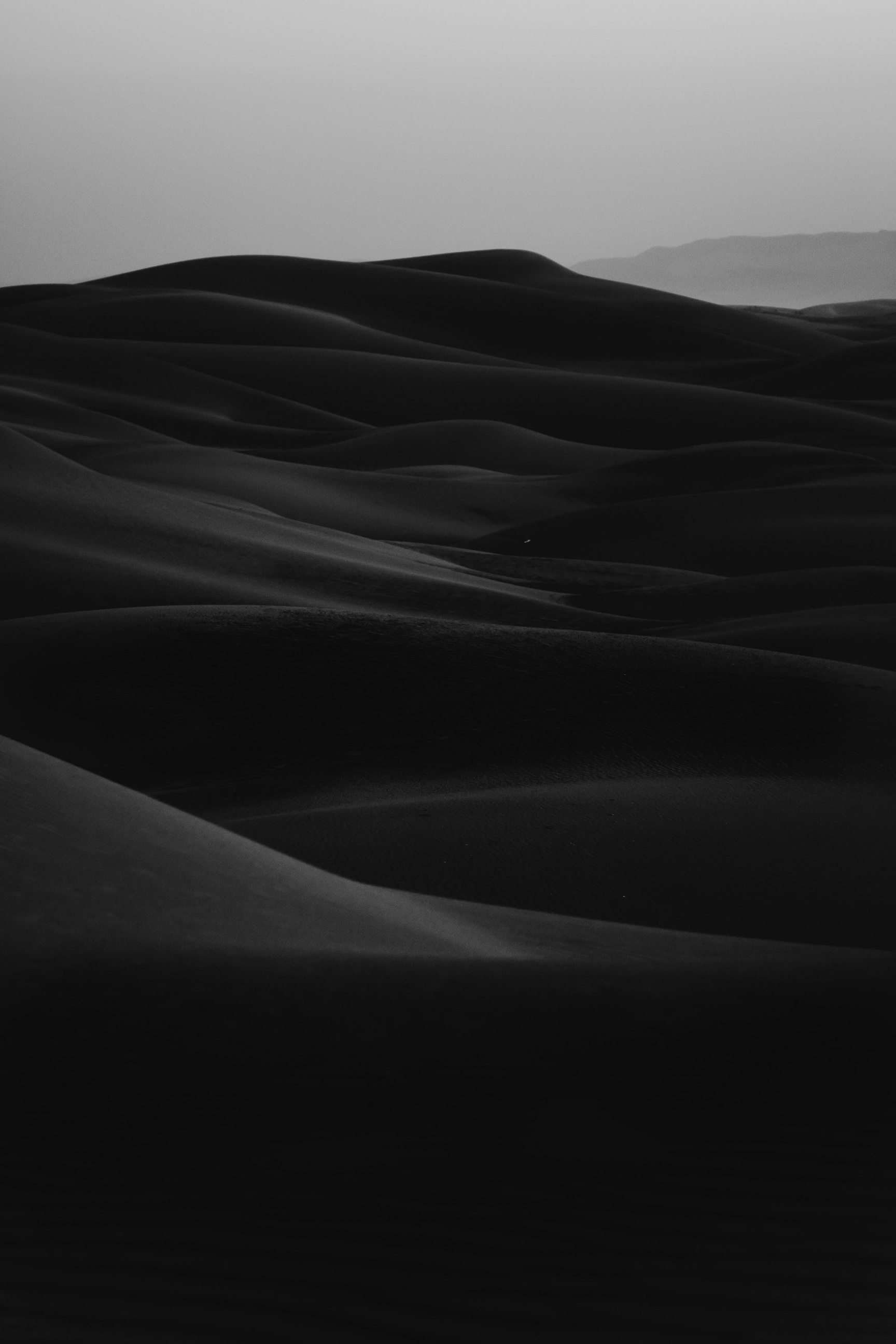Mosé Interior Spaces • image of desert sands, naturally flowing and undulating • image from Unsplash