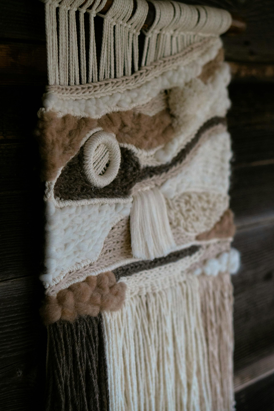 Mosé Interior Spaces • image of tapestry artwork • image from Unsplash